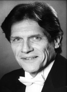 Mr Patrick Thomas MBE