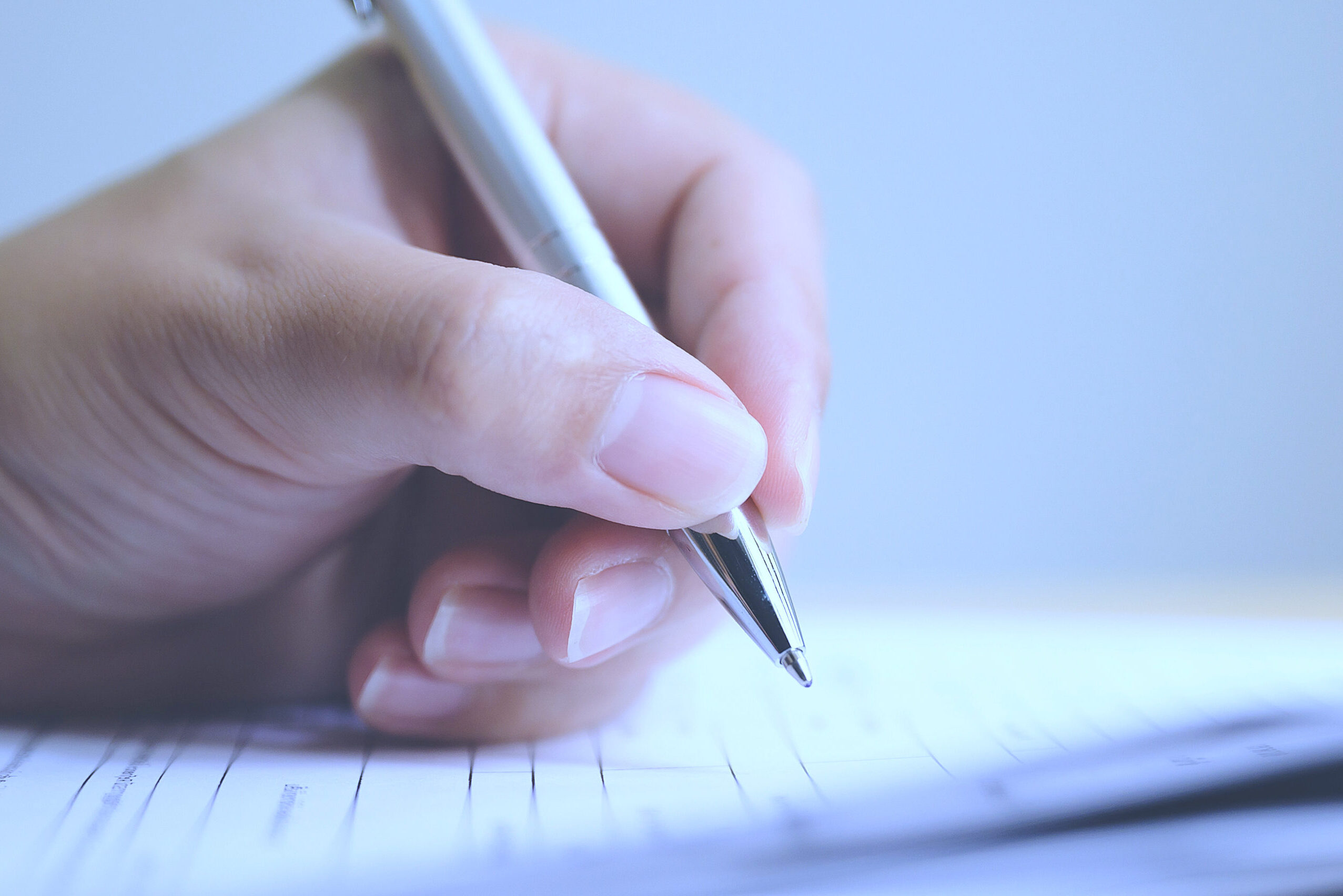 cropped-cropped-hand-signing-paperwork.jpg